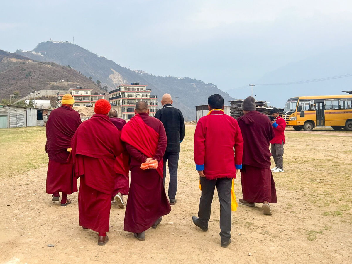 Monks visiting the school grounds